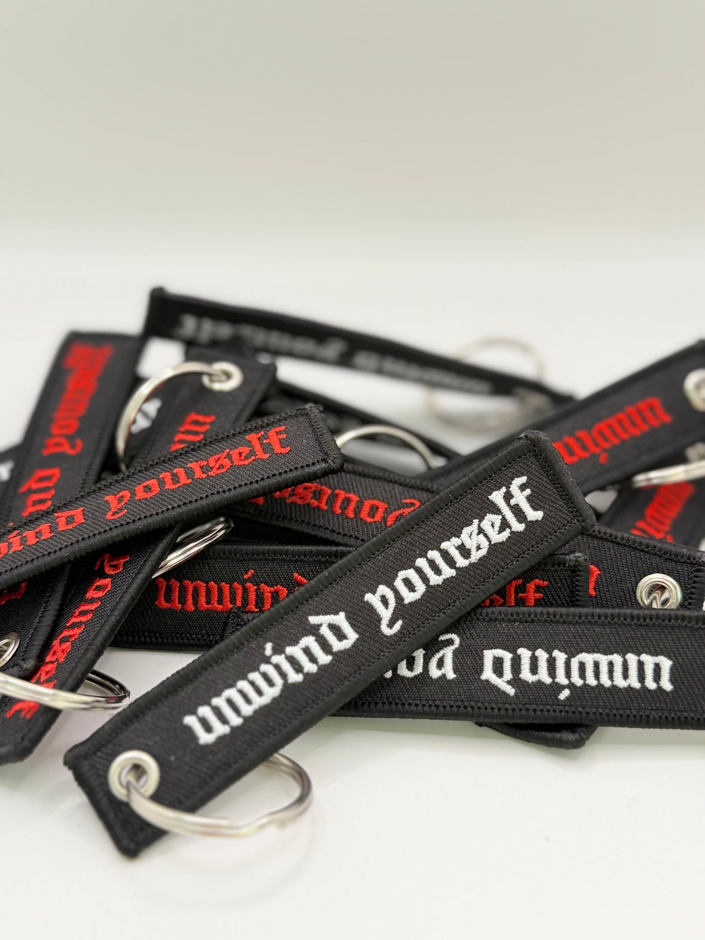 UNWIND YOURSELF KEYCHAIN